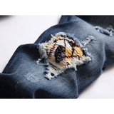 Amiri Jeans Ripped Stretch Jeans